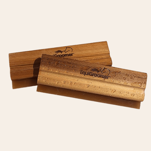 The Wooden EquiGroomer Water Wisk with drops of water