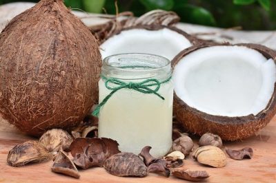 Jar of coconut oil used as a healthy ingredient in homemade no-bake horse treats
